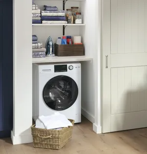 Front view of the GE GFQ14ESSNWW washer dryer combo